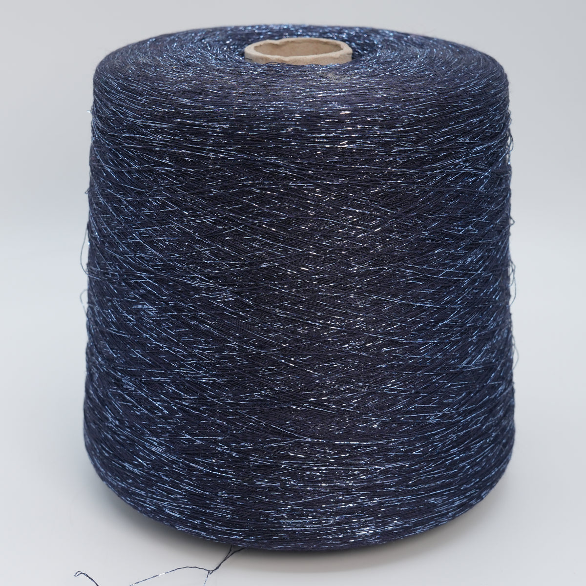 Cone of Frizzante 35000 viscose blend yarn in Navy Shimmer.