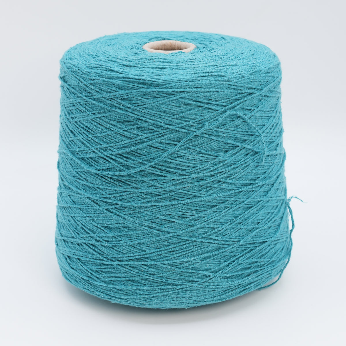 Cone of Bourette Silk 4000 100% silk yarn in Silky Lagoon.