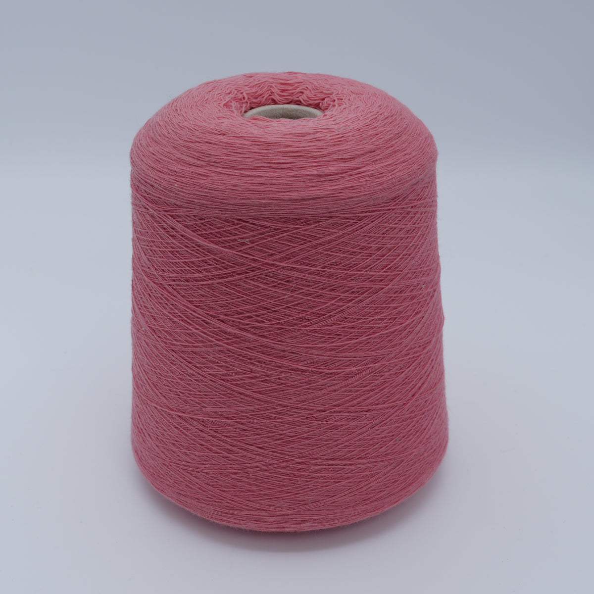 Cone of Canberra 1/15 100% lambswool merino yarn in Berry Petal.