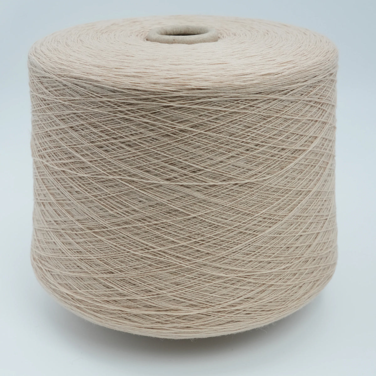 Cone of Canberra 1/15 100% lambswool merino yarn in Cream Fleece.