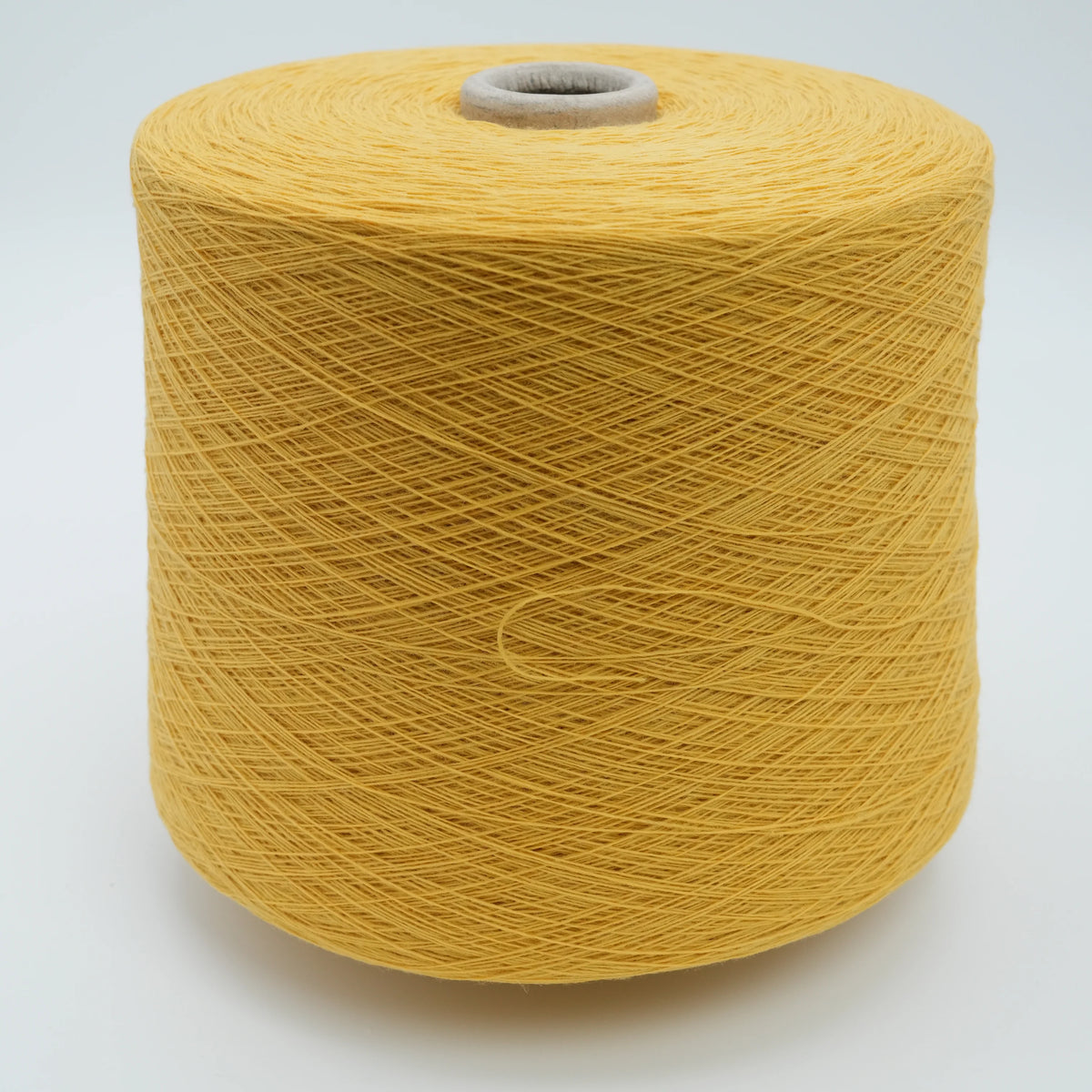 Cone of Canberra 1/15 100% lambswool merino yarn in Golden Rye.