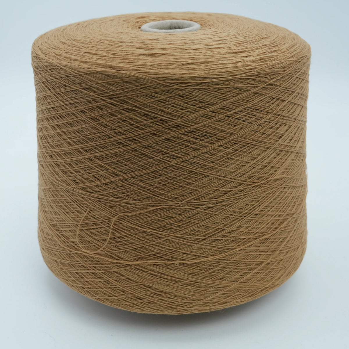 Cone of Canberra 1/15 100% lambswool merino yarn in Soft Ochre.