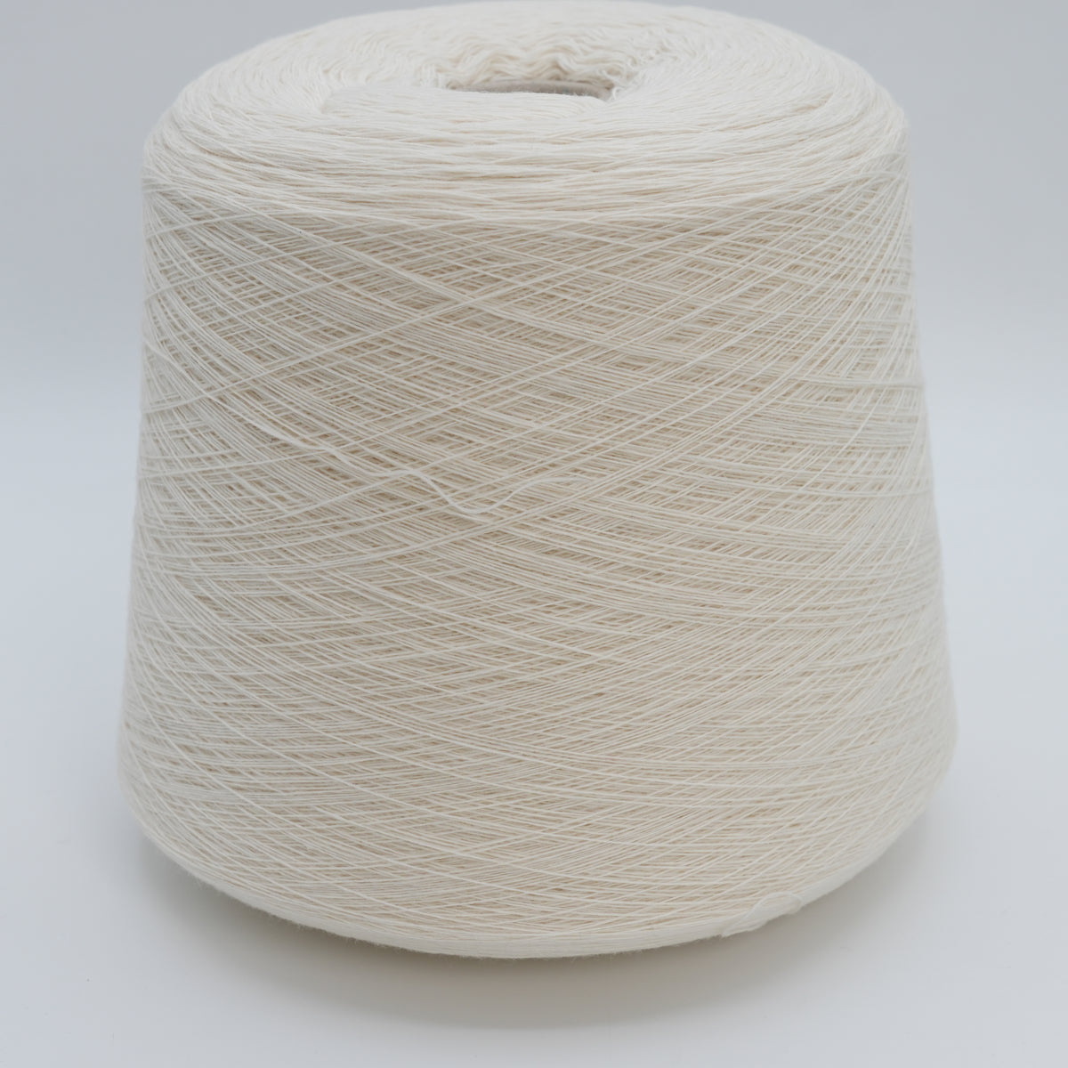 Cone of Canberra 1/15 100% lambswool merino yarn in white.