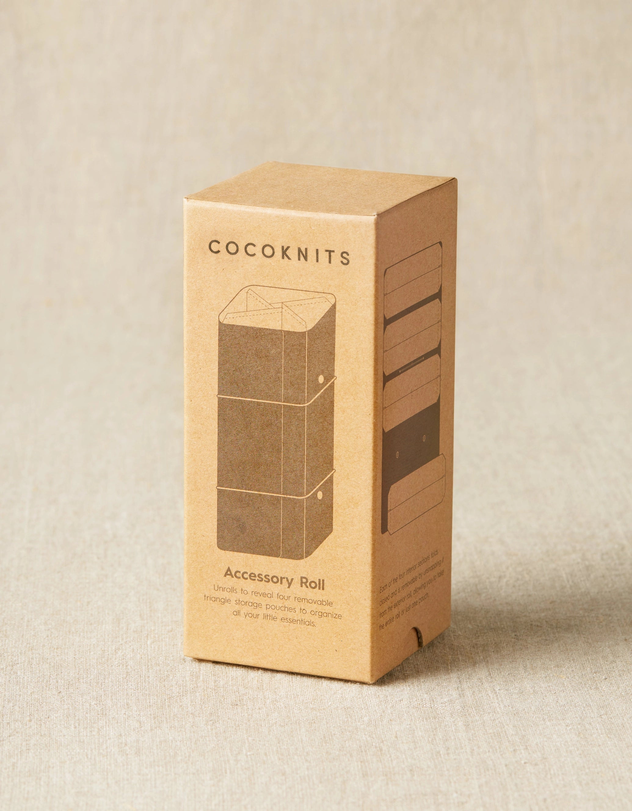 Cocoknits Accessory Roll in Gray shown in its original kraft paper retail packaging