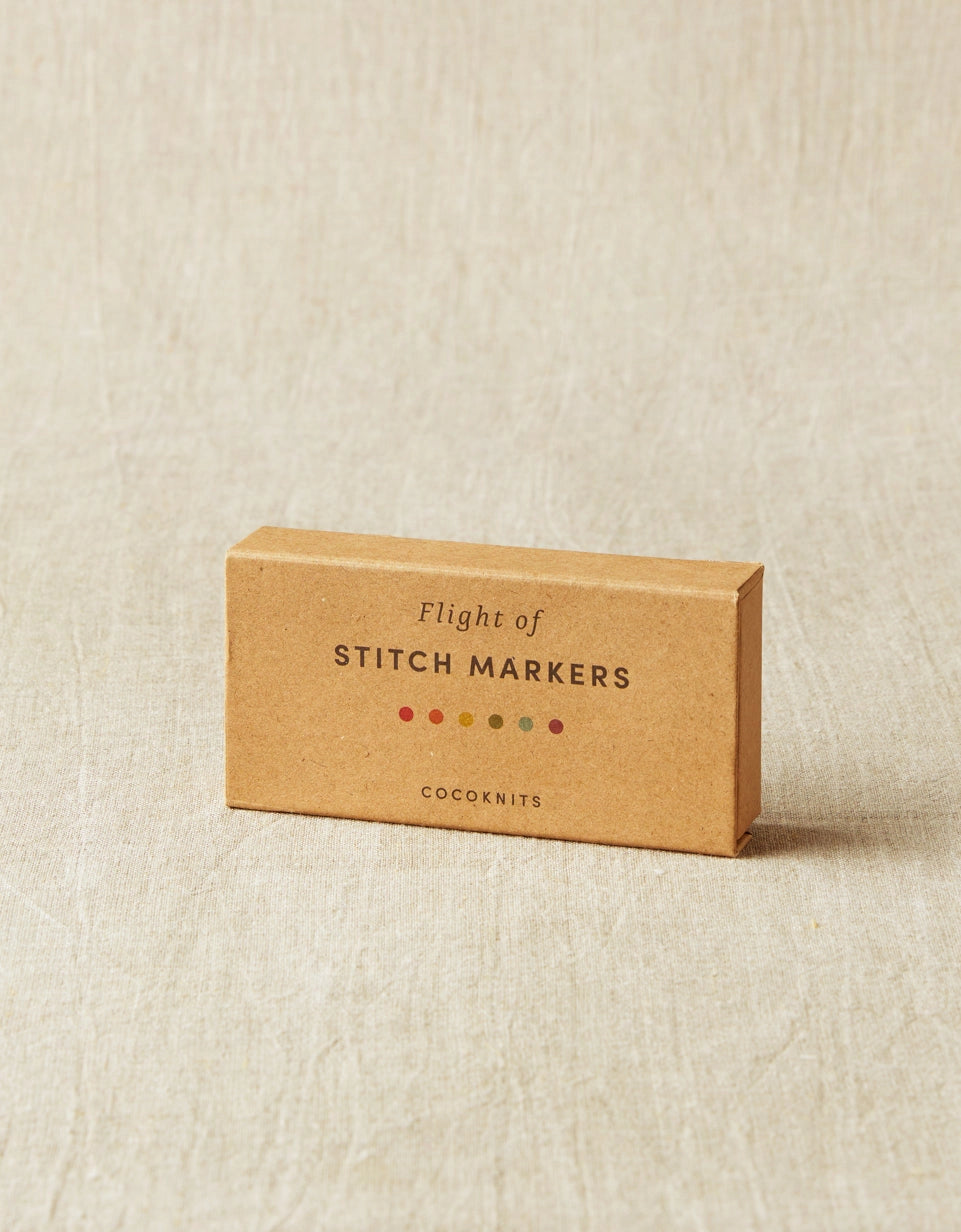 Cocoknits Flight of Stitch Markers in closed reusable kraft storage box