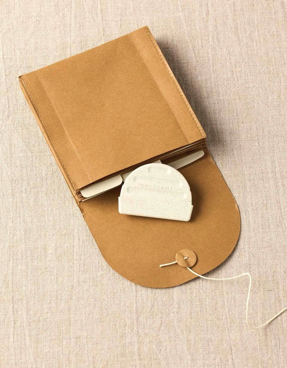 Cocoknits Fuzz Off Comb II with removable protective cover shown open