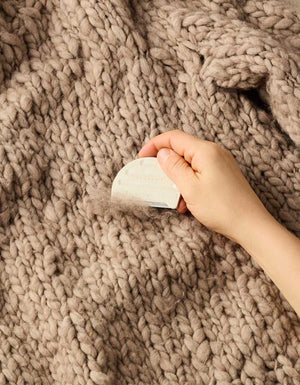 Cocoknits Fuzz Off Comb II removing pills and surface fuzz from knitted fabric
