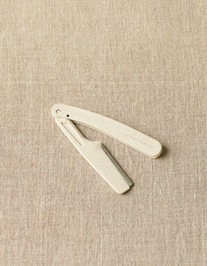 Cocoknits Fuzz Off Comb original shown open with folding handle and steel comb