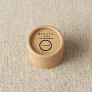 Cocoknits Colorful Ring Stitch Markers Jumbo in their compact wooden storage tin