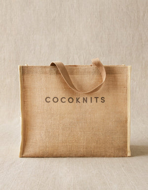 Cocoknits Jute Tote front view with cotton webbing handles and Cocoknits logo
