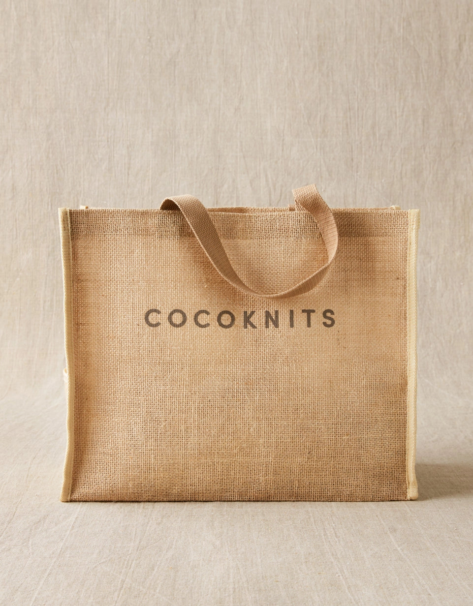 Cocoknits Jute Tote front view with cotton webbing handles and Cocoknits logo