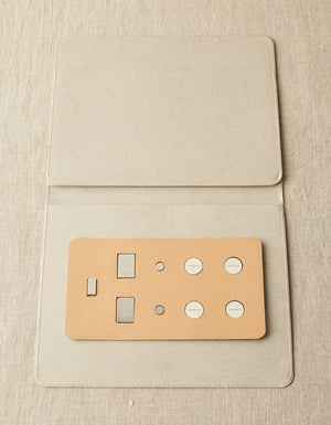 Cocoknits Maker's Board in Gray folded flat with included magnets displayed