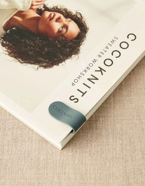 Cocoknits Maker's Clip in Gray used as a bookmark