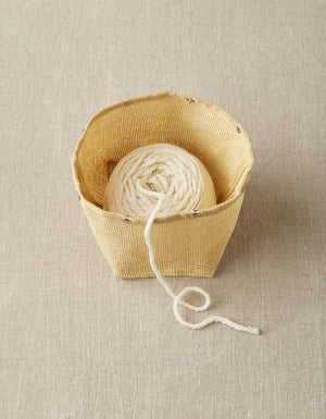Cocoknits Natural Mesh Bag with a large ball of yarn stored inside