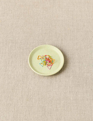 Cocoknits Notions Dish in Celery holding colorful stitch markers