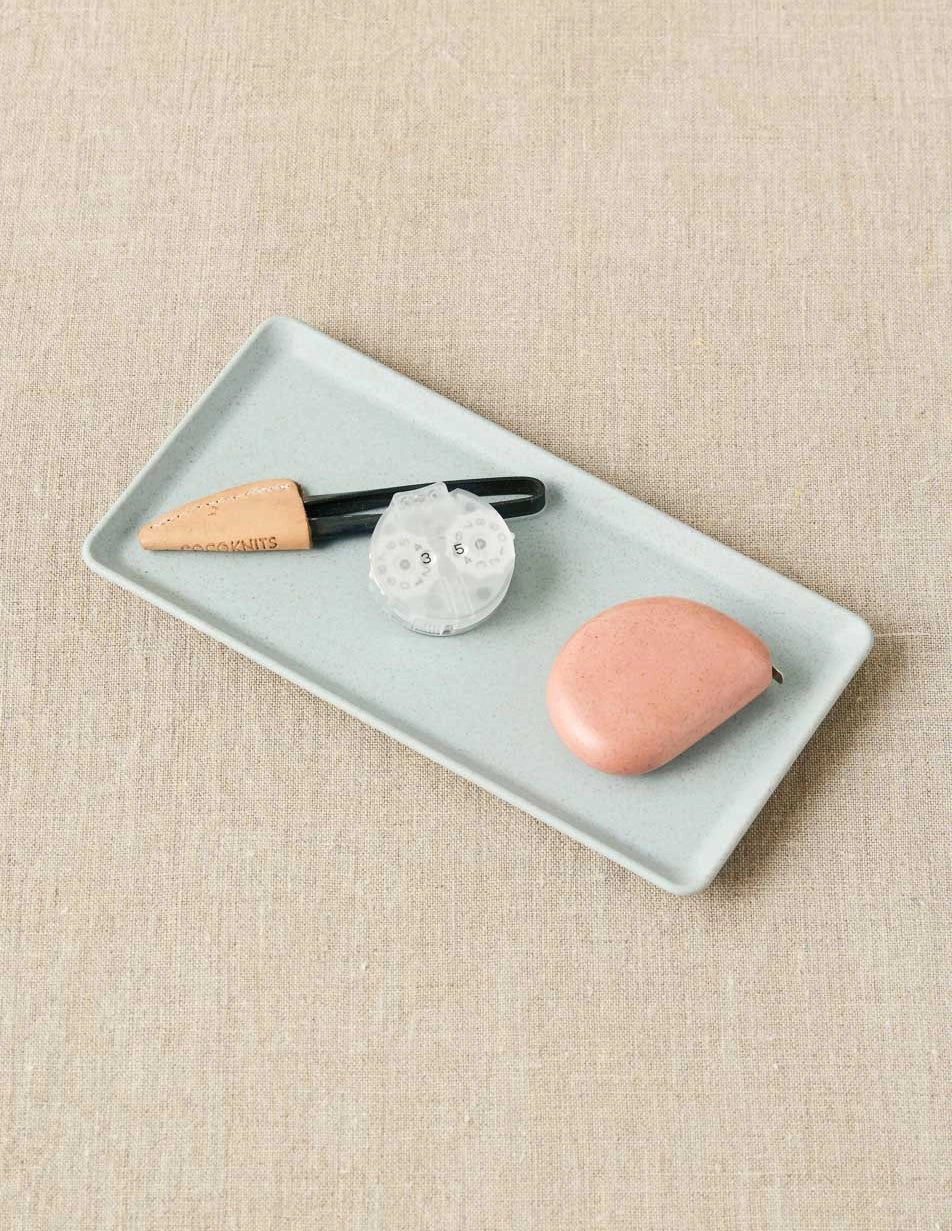 Cocoknits Notions Dish in Fog holding small knitting notions