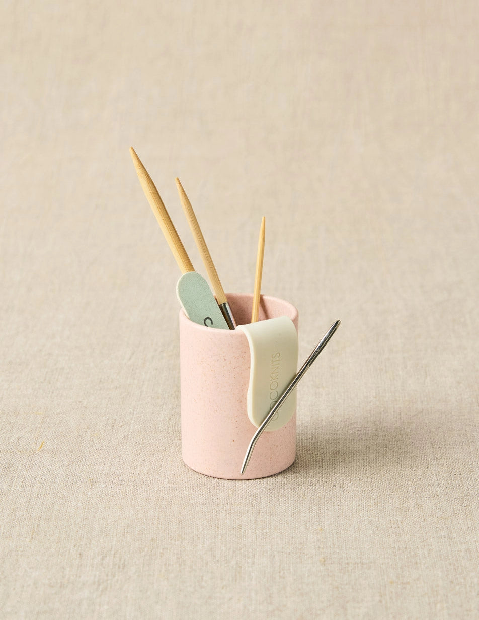 Cocoknits Notions Holder Cup in Shell with knitting needles and small tools
