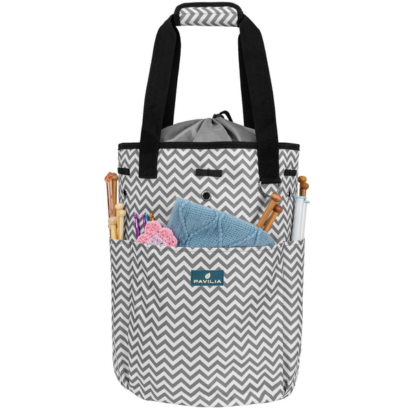 Crochet Yarn Organizer Knitting Bag. Gray chevron organizer bag with yarn and crochet tools in exterior pockets.