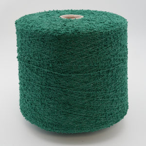 Cone of Curly bouclé cotton and polyamide blend yarn in emerald green.
