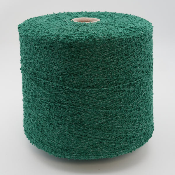 Cone of Curly bouclé cotton and polyamide blend yarn in emerald green.