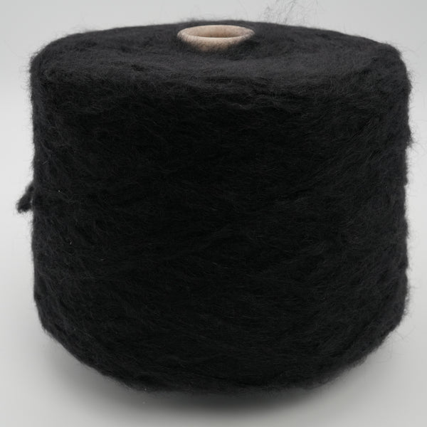 Cone of Fantastico fluffy wool-mohair-polyamide blend yarn in Noir Velours.