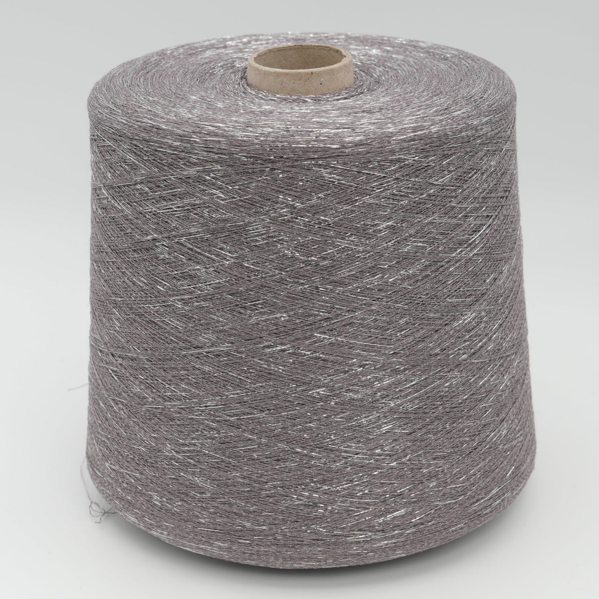 Cone of Frizzante 35000 viscose blend yarn in Ash Orchid.