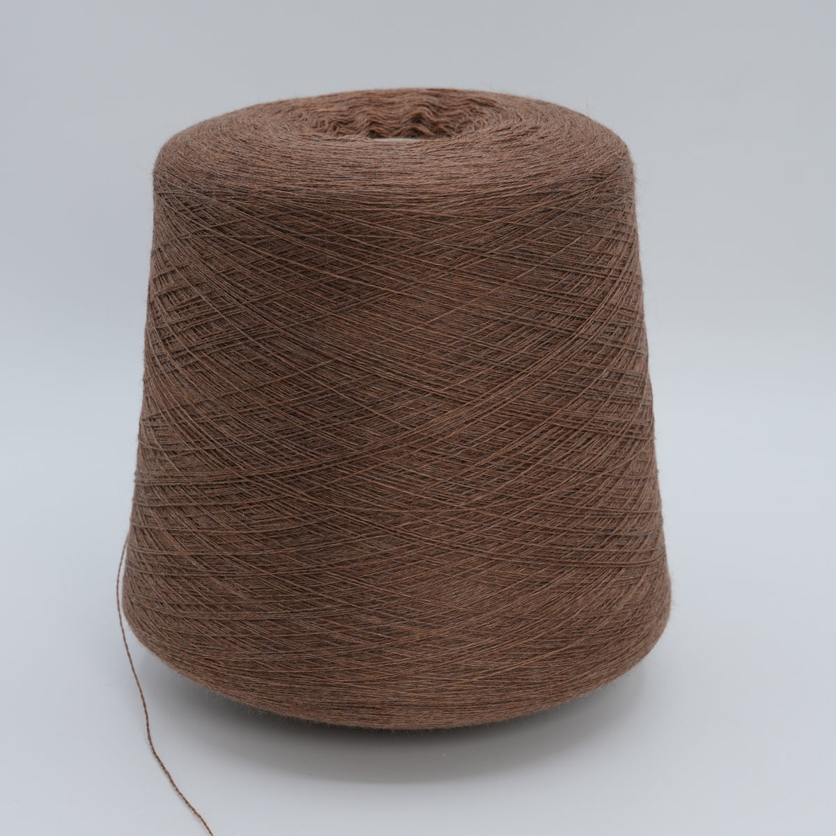 Cone of Harmony 2/30 100% merino yarn in brown.