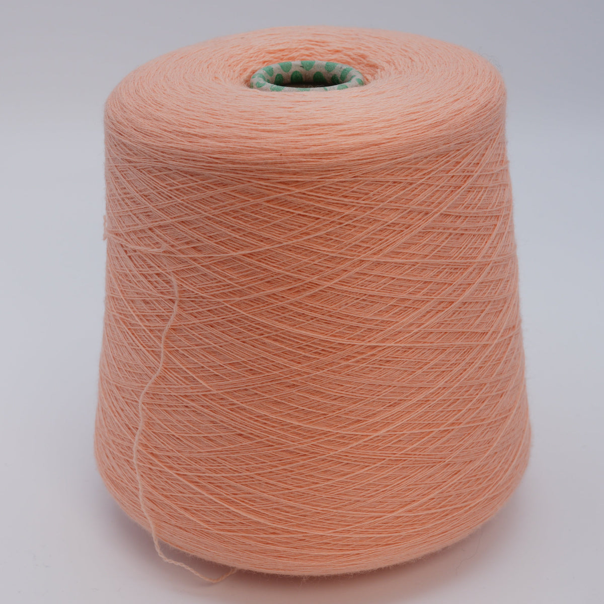 Cone of Harmony 2/30 100% merino yarn in peach.