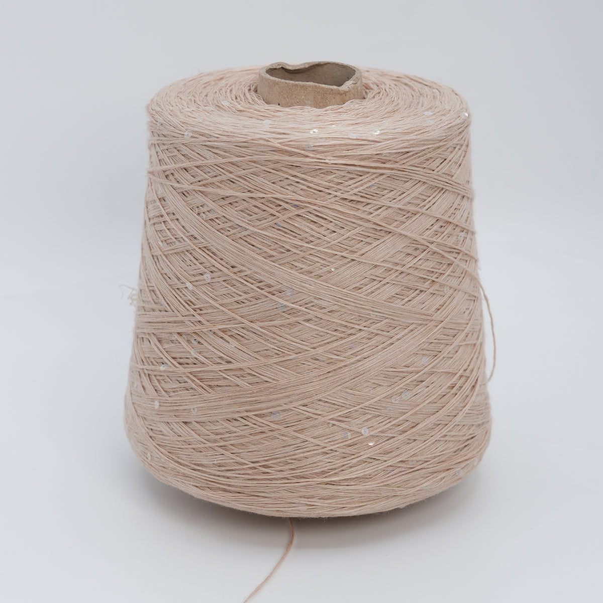 Cone of Lino 4200 linen yarn in Sand Sequin, a soft sandy beige with scattered sequins, on a white background.