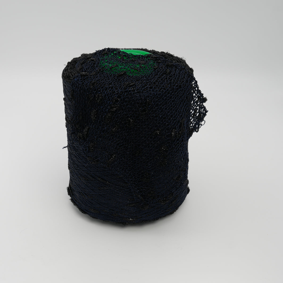 Cone of Luckystar 6000 viscose and slubbed lurex blend yarn in black.