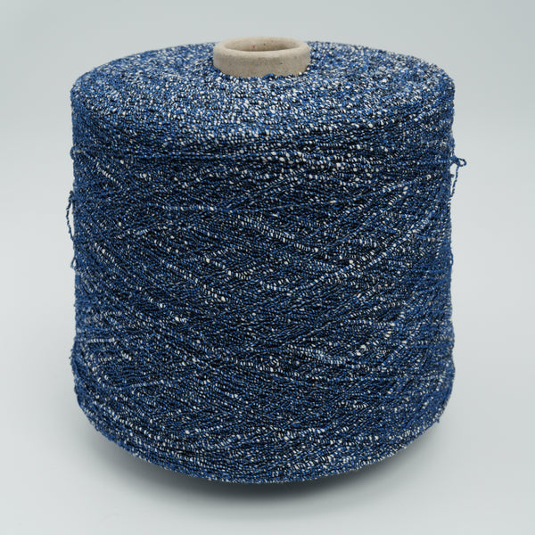 Cone of Millefili Cocobello viscose and lurex blend yarn in Cotton.