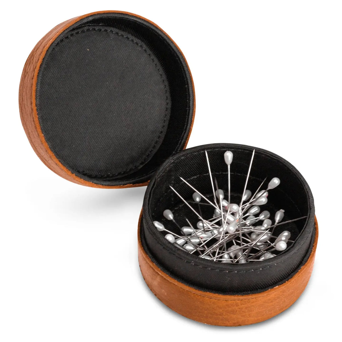 Muud Emeli Magnetic Leather Box | Whisky. Open round leather box holding metal pins.