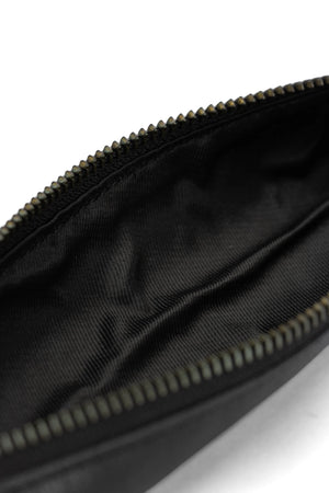 Muud Hee Case | Slim Leather Pouch in Black. Close-up of the open case showing its lining.