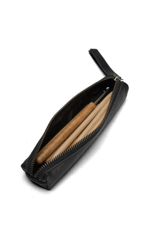Muud Hee Case | Slim Leather Pouch in Black. Case opened to show wooden knitting needles.