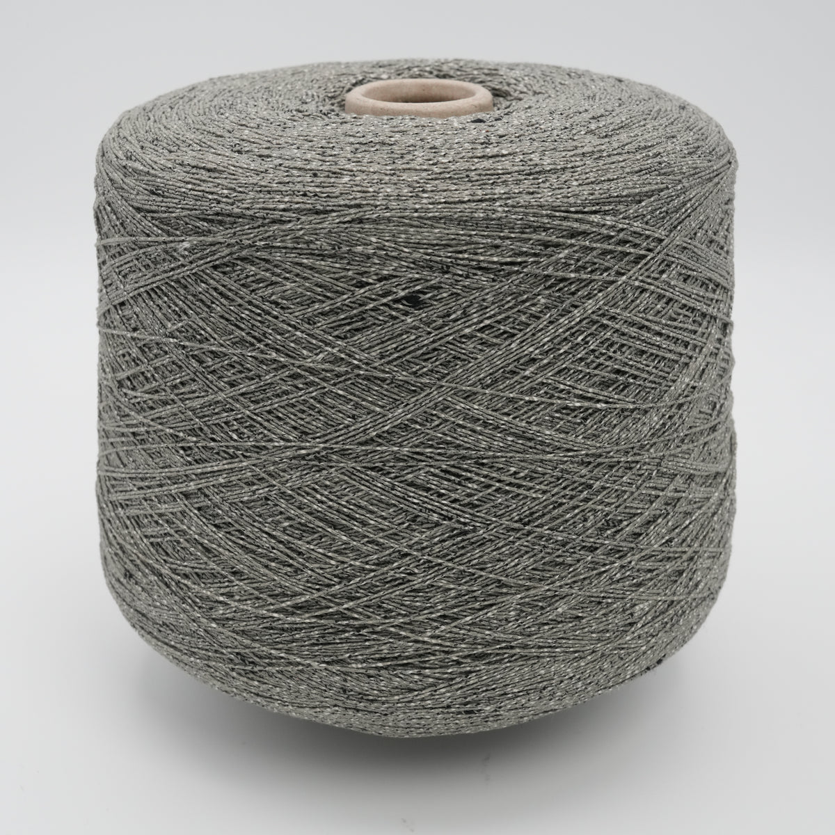 Cone of Neppyness cotton and polyamide blend yarn in Graphite Mélange.