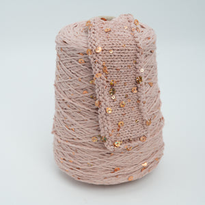 Cone and knitted swatch of Urlo royal blush – 100% cotton yarn.