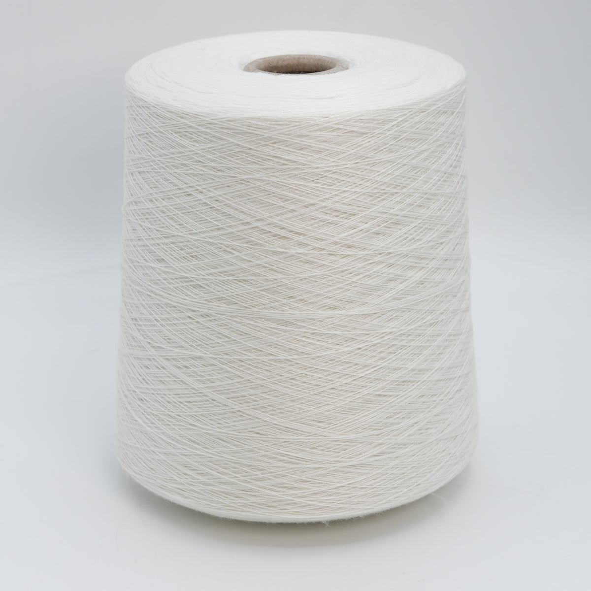 Cone of Victoria 2/30 100% merino yarn in Snow White.