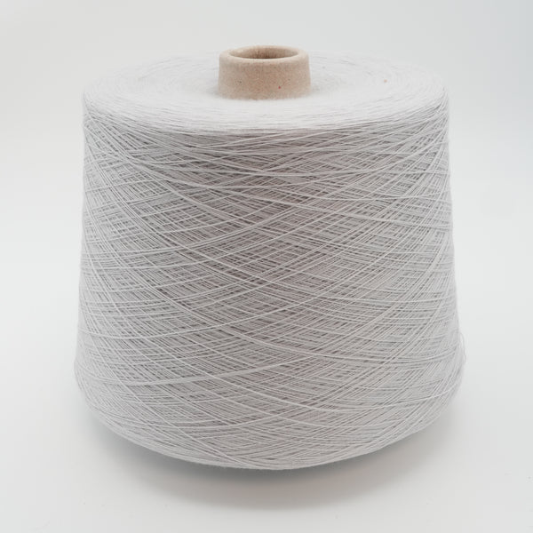 Cone of Zibibbo cotton and elastane blend yarn in Delicate Lilac.
